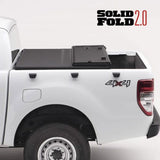 Tapa Plegable Dura Cubre Pick-Up Solid Fold 2.0 Nissan Navara (21+) - Extang